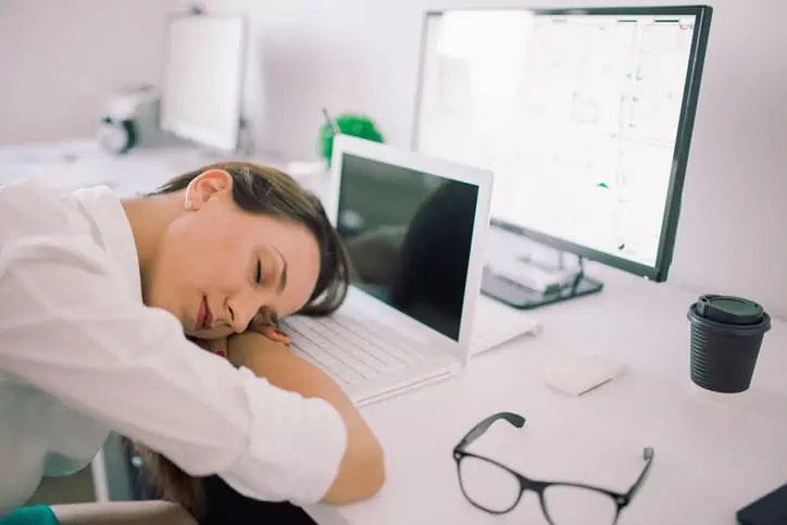 women sleeping at work